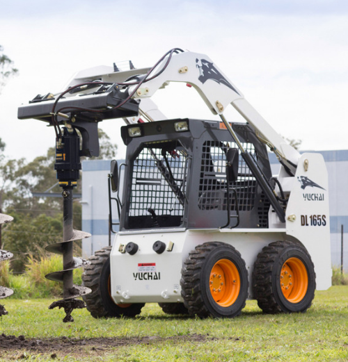 auger drive on skid steer with auger bit