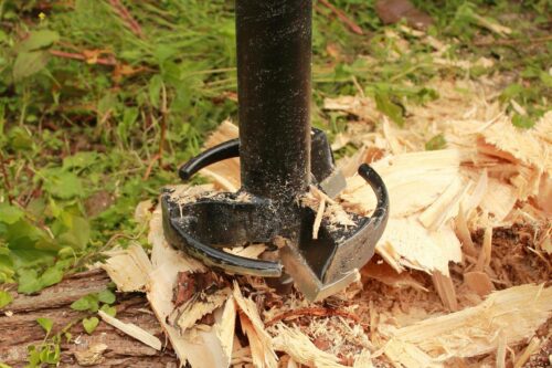 stump planer bit grinding a stump