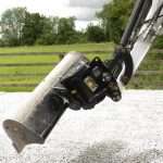 geith tilt coupler with bucket on excavator