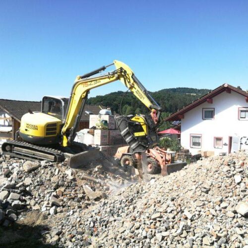 MB Crusher Bucket at work on a Wacker Neuson Excavator